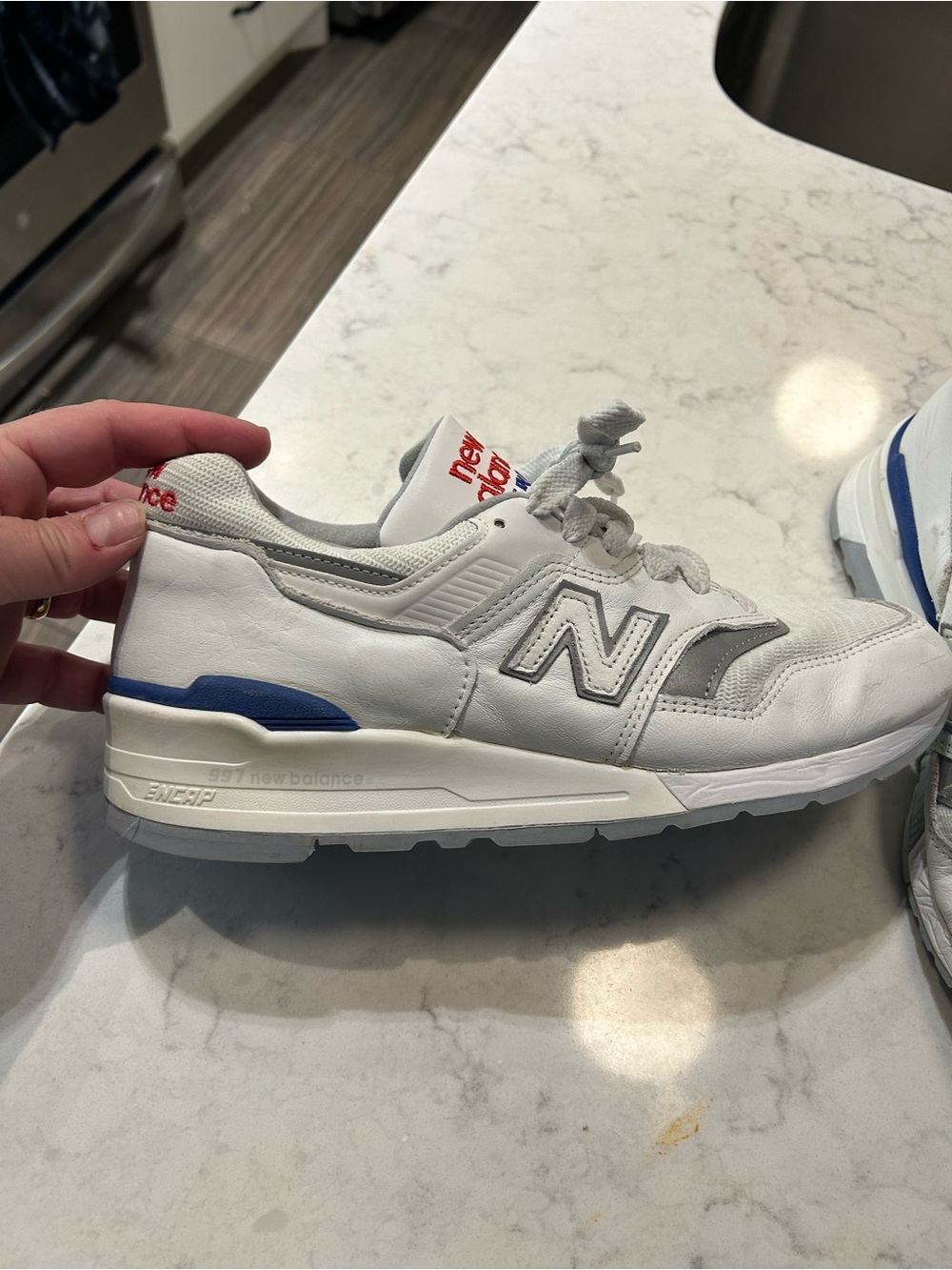 New Balance 997 rare baseball paWhite Leather Sneaker with Gray and Blue Accents